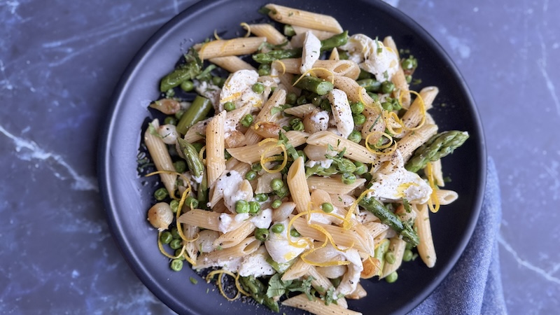 One recipe featuring burrata for spring: Pasta with Burrata, Lemon and Spring Vegetables. (JeanMarieBrownson/TCA)