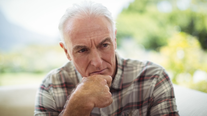 Man outside pondering the Great Mystery of life. By Wavebreakmedia