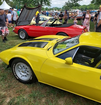 At the Richmond Car Show 2025 - bright yellow and red cars of the baby boomer era