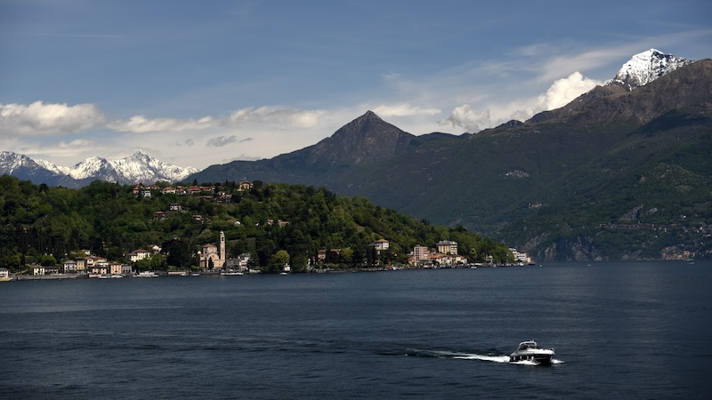 Lake Como is lined with luxurious villas, crowned by snow-capped mountains, and busy with fleets of little ferries darting from one cute town to another, one of many sights in the Lakes District of Italy. CREDIT: Cameron Hewitt, Rick Steves’ Europe.
