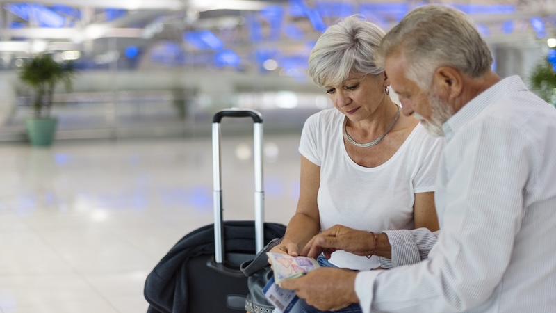 Air travel tips: a senior man and woman at the airport