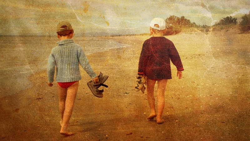 Little boys on the beach, as at the Jersey Shore, with a vintage look to the image. Christophe Rolland1