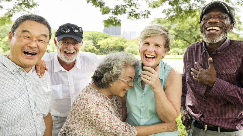 This group of older adults is laughing uproariously, perhaps not concerned about the term senior citizen. Rawpixelimages