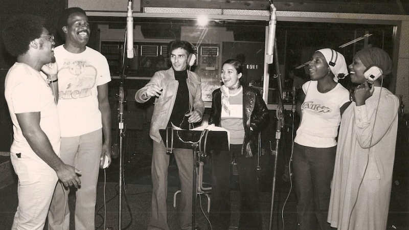 Carol Connors and Bill Conti, center, and other singers recording Gonna Fly Now