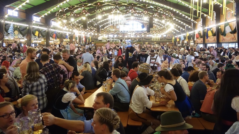 During Oktoberfest, Munich’s Wies’n grounds host around 15 gigantic tents, all of which operate like pop-up beer halls. CREDIT: Rick Steves, Rick Steves’ Europe.