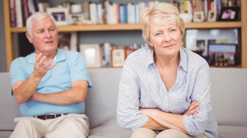 A senior couple argues, experiencing that retirement causes marriage problems. Wavebreakmedia
