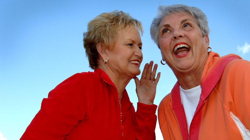 She can't stop gossiping to her friend, but they both love it.