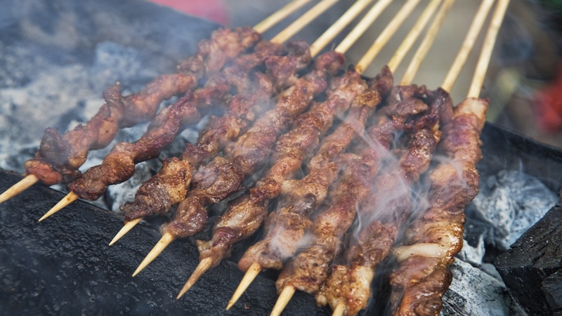 street food in Guilin Guangxi Autonomous Region, China. by dndavis. Street food is a great way to save money on food when traveling
